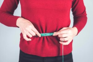 How to Reduce Fat Above the Belly Button: Tips and Solutions